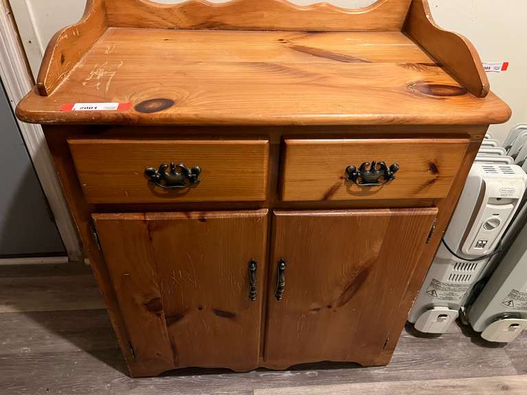 Laundry… Two drawer cupboard/dry sink, believed to be pine, there is some surface wear/scratching, see pictures for details. image