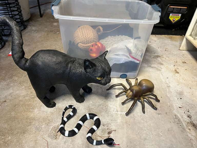 Garage… Tote of assorted Halloween decor, and more. Tote is included, see pictures for details. image