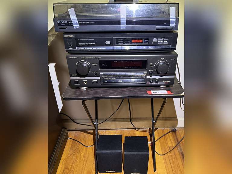 Vintage component stereo system, powers up, includes a Technics stereo receiver, Magnavox CD player, and Kenwood turntable. Also comes with two small 40 W Pioneer speakers, and TV tray, see pictures for details. image
