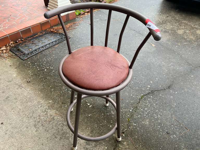 Garage… Metal framed swivel barstool, see pictures for details. image