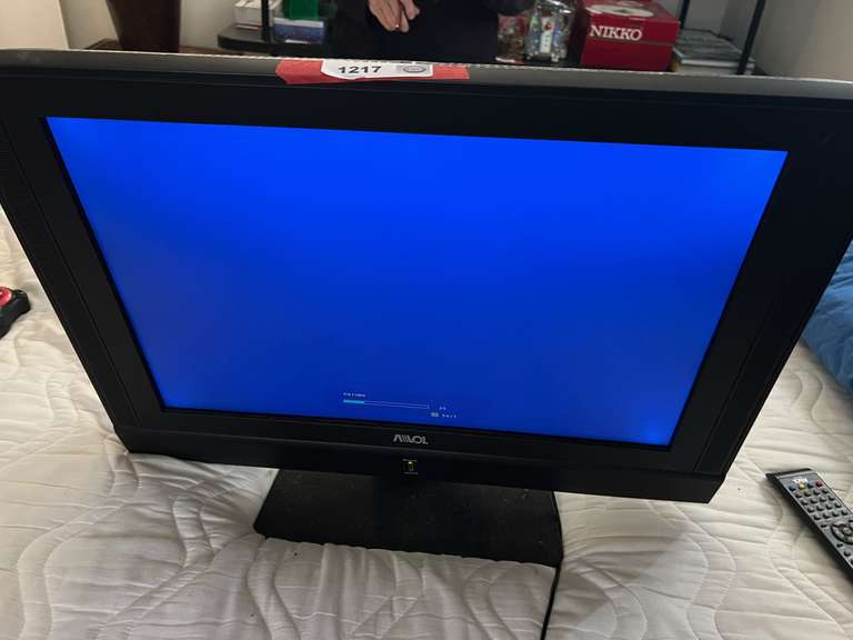 BR2…Amol 22” multisystem LCD wide TV and DVD combo, comes with remote, powers up, see pictures for details. image