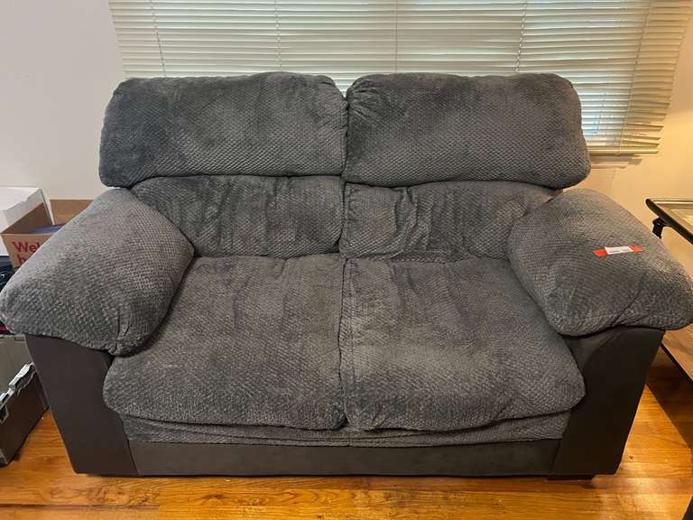 Plush, pillow back loveseat, matches lot 1001, see pictures for details. image