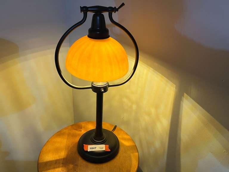 Table/desk lamp with bronze look and Amber glass shade, believed to be from Plow & Hearth, see pictures for details. image
