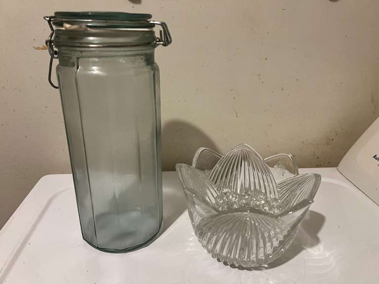 Laundry… Lovely tulip/flower bowl, believed to be Mikasa, also includes a locking lid canister, see pictures for details. image