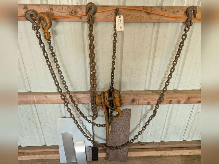 1-1/2 TON CHAIN LEVER HOIST, TWO EXTRA 3/8 IN LINK CHAINS, AND SMALL PIECES OF SHEET METAL BEHIND image