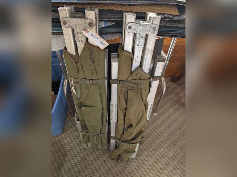 PAIR OF FOLDING METAL FRAME MILITARY COTS image