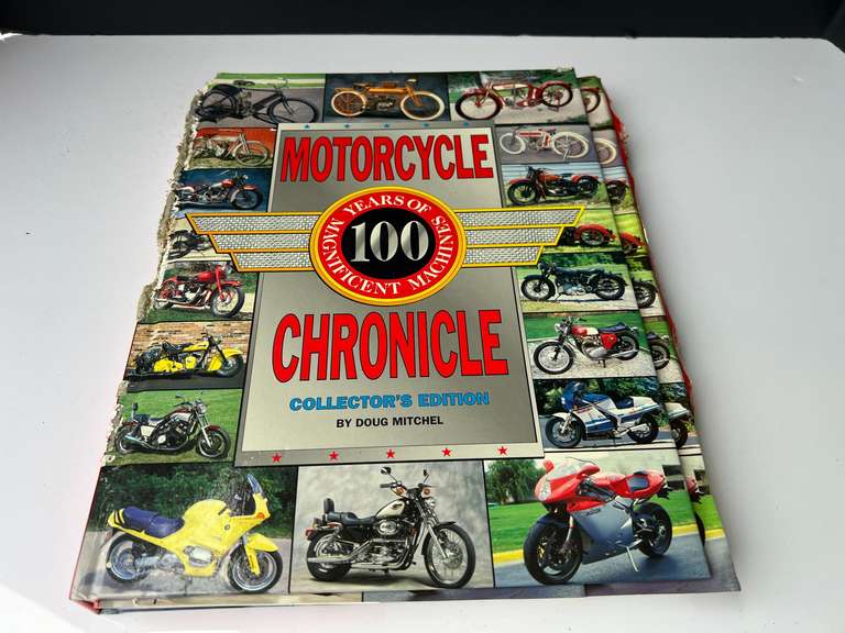 Garage… Hardbound “Motorcycle Chronicle, Collectors Edition, binding has been worn, see pictures for details. image