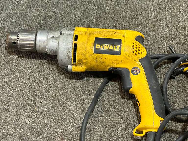 DeWalt 1/2” electric drill, powers up, see pictures for details. image
