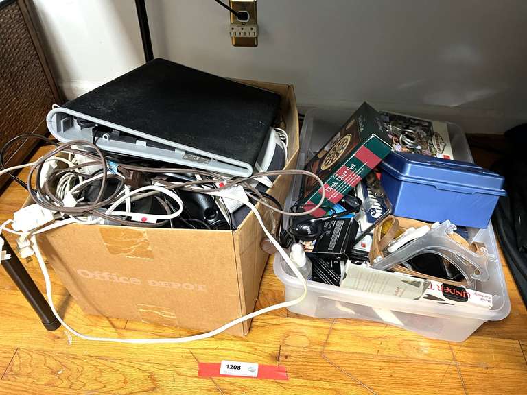 BR2…Large mystery lot to include speakers, cords, household items, books, and more. See pictures for details. image