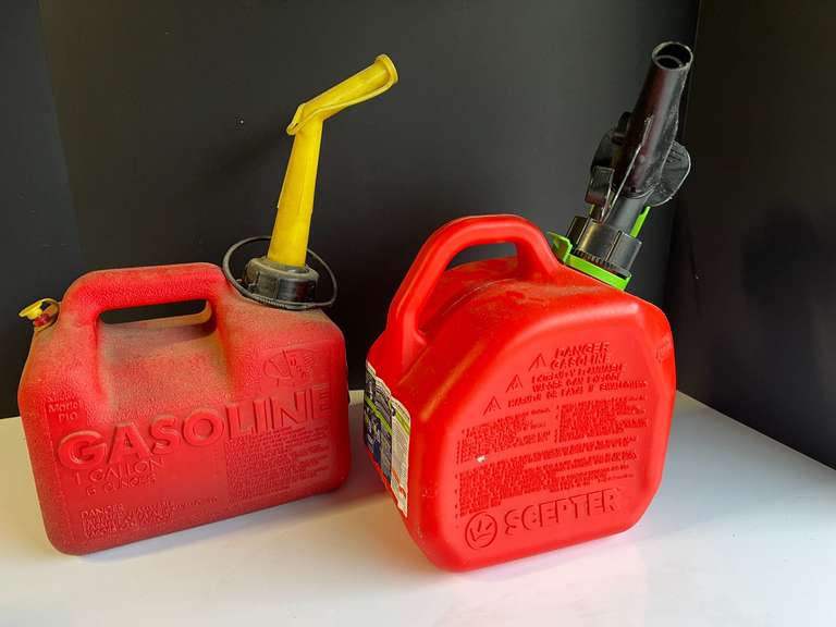 Garage… 1 gallon gas cans, two pieces, see pictures for details. image