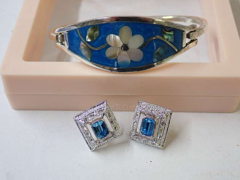 Silver Tone Bracelet with Floral Design and Blue Stone Earrings Set image