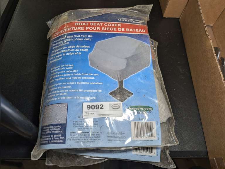 PAIR OF OUTDOOR WORLD MARINE BOAT SEAT COVERS IN ORIGINAL PACKAGES image