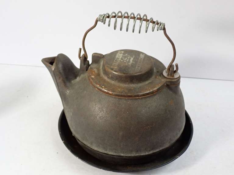 Wagner's 1891 Original Cast Iron Tea Kettle with Trivet image
