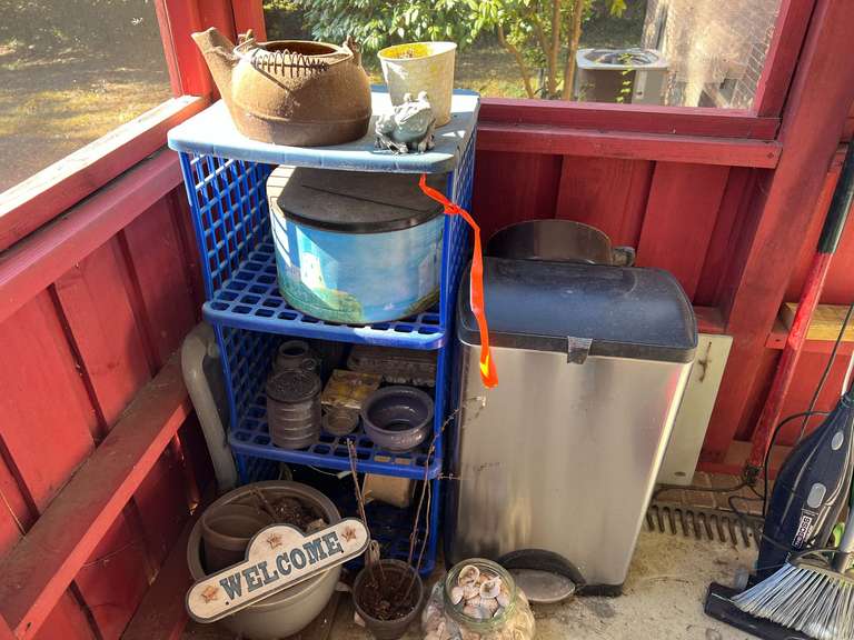 BP inside…Plastic shelving unit, planters, seashell collection, cast-iron teapot, no lid, and more. See pictures for details. image