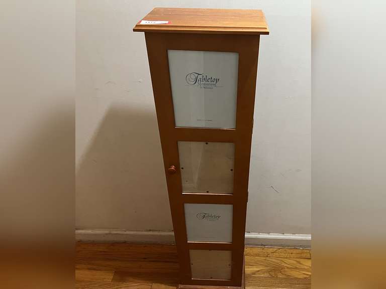 Hall… Tall wooden cabinet with photo display front. see pictures for details. image