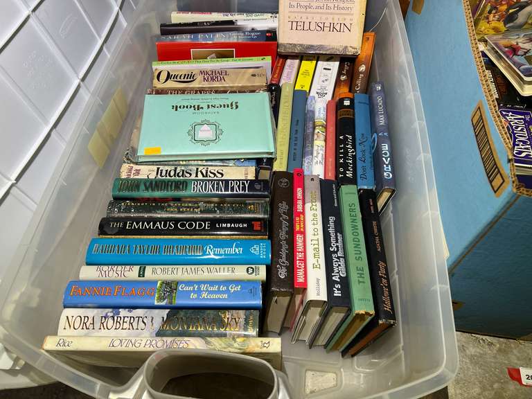 Garage… Tote of assorted hardbound books, tote is included, see pictures for details. image