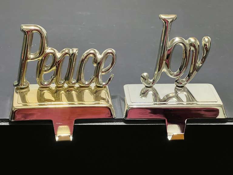BR1…Metal “Peace” and “Joy “stocking hangers, set of two, see pictures for details. image