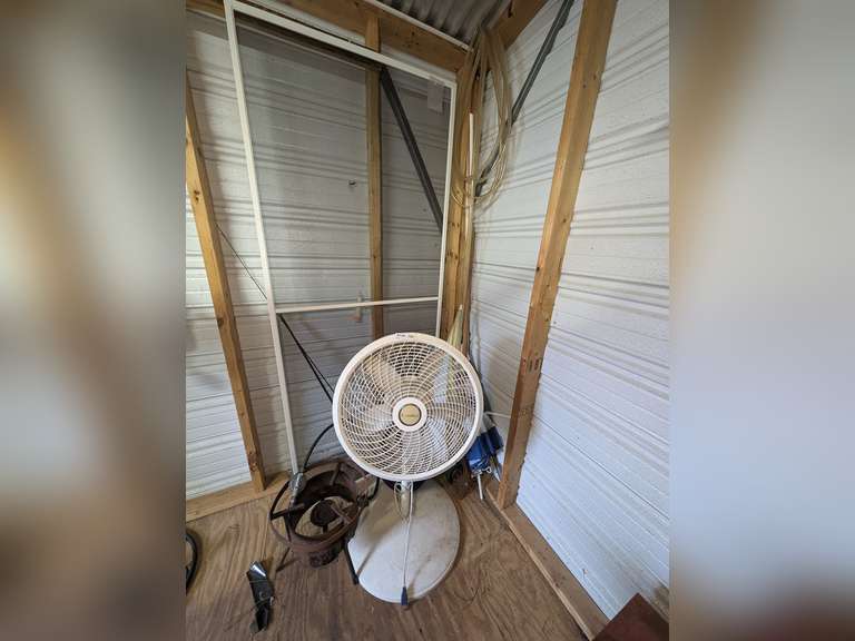 ALL ITEMS IN CORNER MARKED 9126 INCLUDING PROPANE FISH COOKER, OUTDOOR UMBRELLAS, CLEAR PLASTIC TUBING, LASKO OSCILLATING FAN, DOOR SCREEN, VINTAGE GARDEN WEED EDGER, AND MORE image