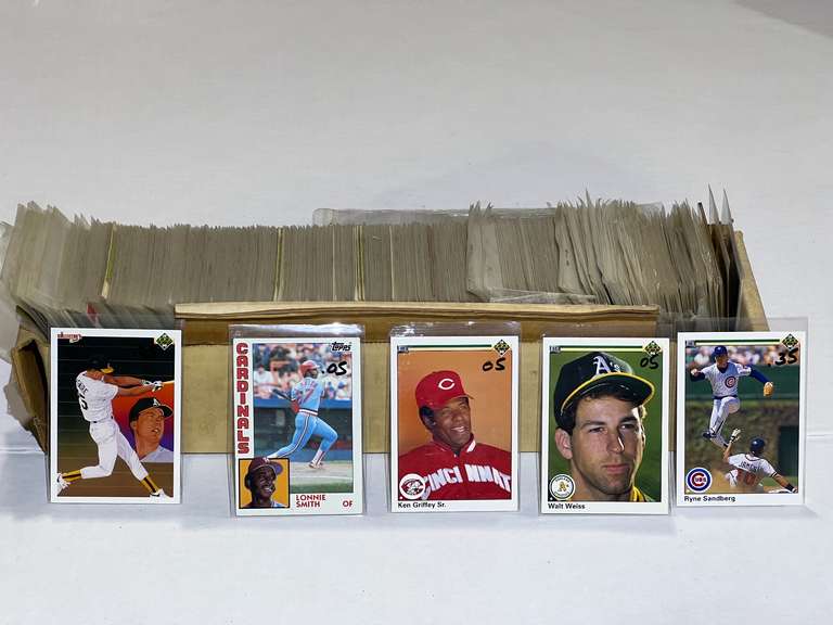 Box of assorted unsearched baseball/sports cards, see pictures for details. image