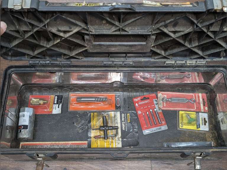 LARGE TOOLBOX AND CONTENTS INCLUDING CIRCLE CUTTER TOOL, MILWAUKEE TILE AND NATURAL STONE BIT SET, TURNBUCKLE, WATER HEATER THERMOSTAT SOCKET, AND MORE image