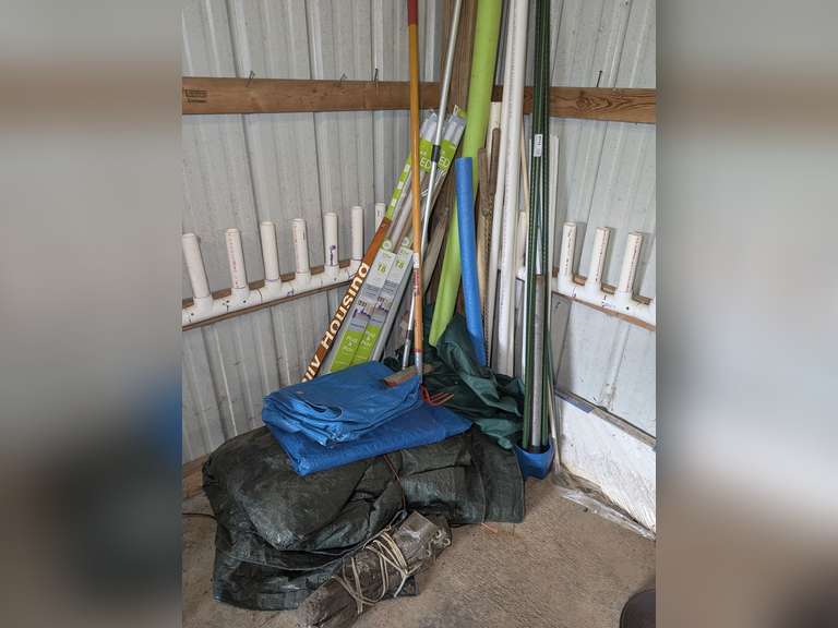 ALL ITEMS IN GARAGE CORNER MARKED 9112 INCLUDING PVC PIPE, 4-FT LED T8 BULBS, TARPS, CULTIVATOR FORK, AND MORE image