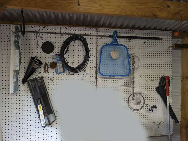 ALL ITEMS HANGING ON PEGBOARD MARKED 9124 INCLUDING TILE CUTTER, FUNNEL, SQUEEGEE, SMALL SECTION OF CHAIN, AND MORE image