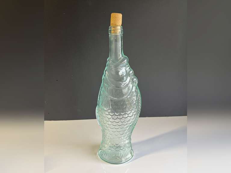 Garage…Fish shaped collectible wine bottle, see pictures for details. image