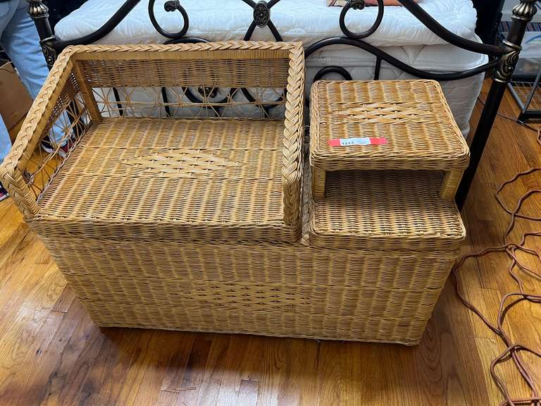 BR2…Wicker two sided storage bench with content, see pictures for details. image