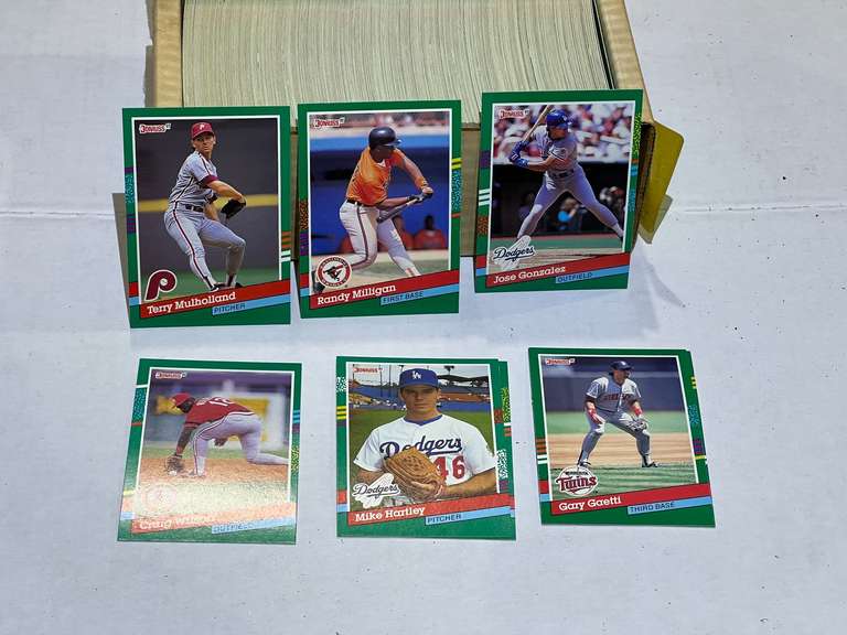 Box of assorted unsearched baseball/sports cards, see pictures for details. image