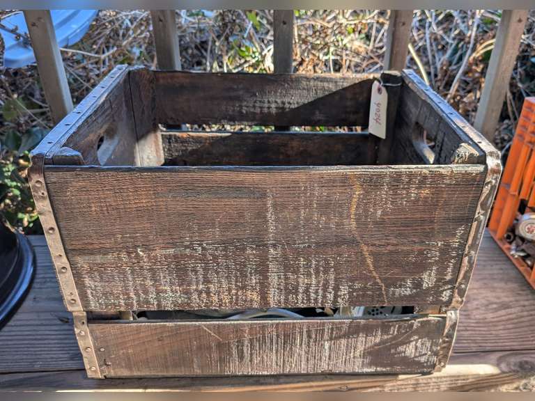 ANTIQUE WOODEN CRATE AND CONTENTS INCLUDING OLD BABY SHOES, SPRINKLER HEAD, POWER BLOCK, AND MAGNIFYING GLASS image
