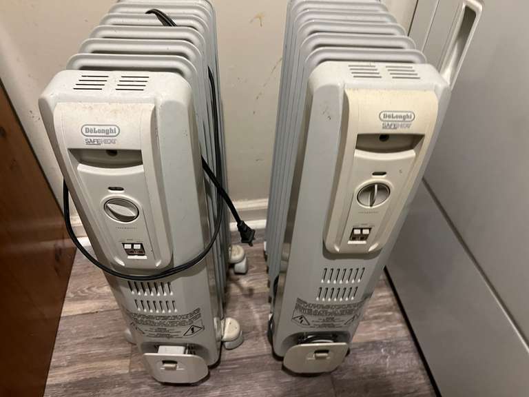 Laundry…DeLonghi portable heaters, set of two, both power up, see pictures for details. image