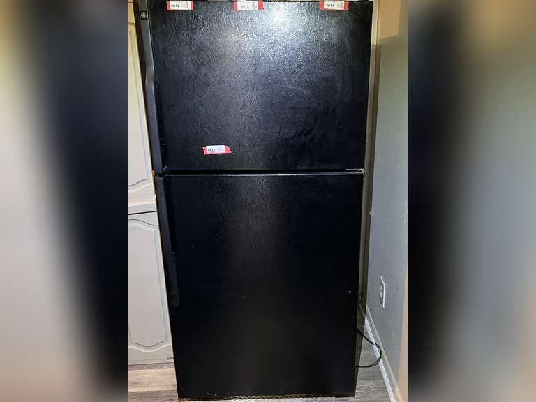 Laundry… GE refrigerator with top freezer, does work, see pictures for details. image