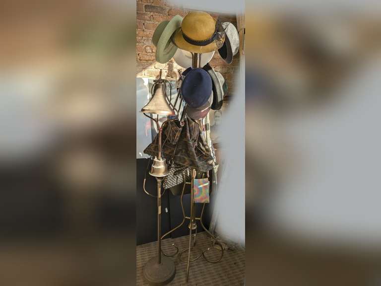 ANTIQUE DOUBLE LIGHT FLOOR LAMP AND BRASS COAT RACK WITH CONTENTS INCLUDING NAME BRAND PURSES, LADIES HATS, AND MORE image