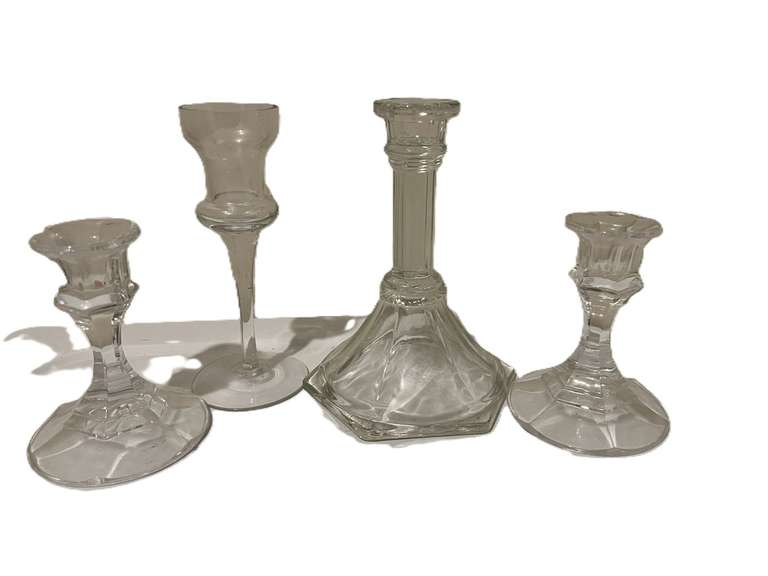 Laundry… Clear Glass candlestick holders, four pieces, see pictures for details. image