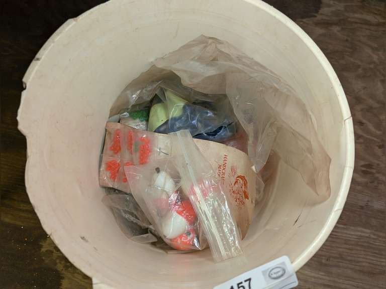 BUCKET FILLED WITH FISHING ACCESSORIES, LURES, AND LURE PARTS image