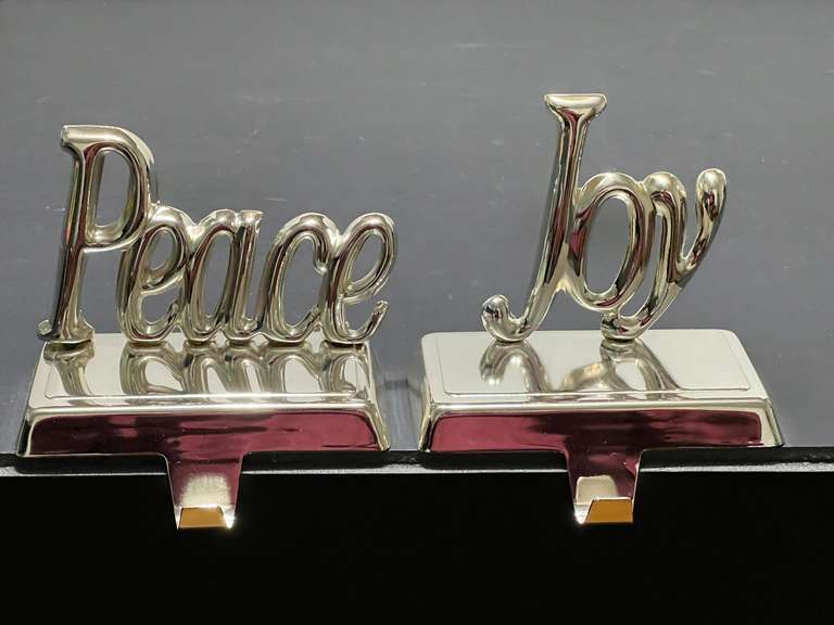 BR1…Metal “Peace” and “Joy “stocking hangers, set of two, see pictures for details. image