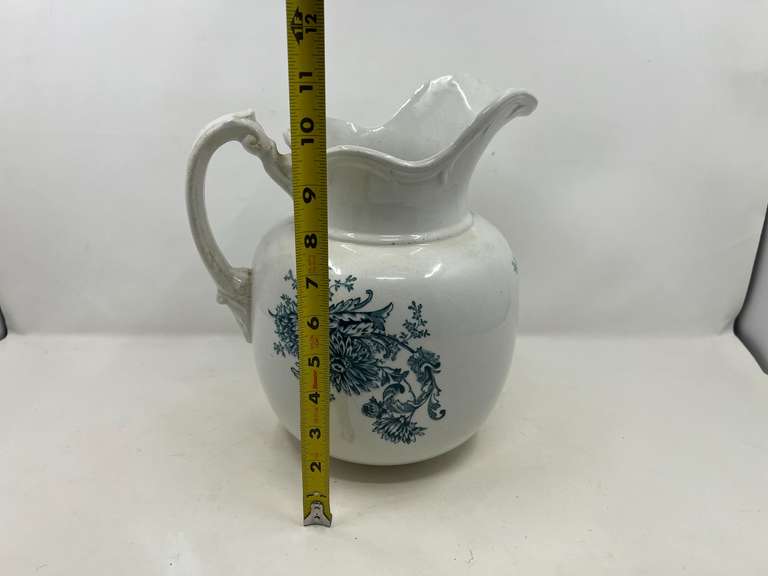 DR…Antique Buffalo Pottery pitcher with floral motif, see pictures for details.