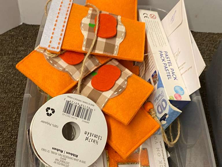 Assorted toiletries and crafting items, includes body wash, wine bottle bag, toothbrushes, toothpaste, and much more. Tubs are not included, see pictures for details.