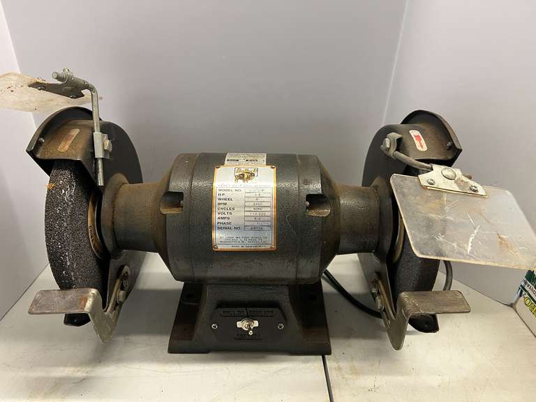 Buffalo heavy duty bench grinder, powers up, see pictures for details.