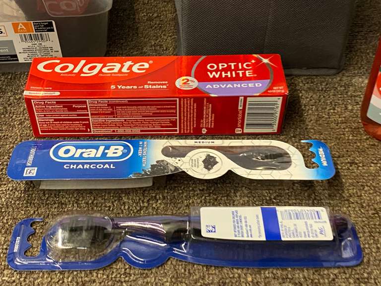 Assorted toiletries and crafting items, includes body wash, wine bottle bag, toothbrushes, toothpaste, and much more. Tubs are not included, see pictures for details.
