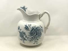DR…Antique Buffalo Pottery pitcher with floral motif, see pictures for details.