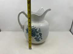DR…Antique Buffalo Pottery pitcher with floral motif, see pictures for details.