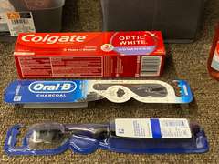 Assorted toiletries and crafting items, includes body wash, wine bottle bag, toothbrushes, toothpaste, and much more. Tubs are not included, see pictures for details.