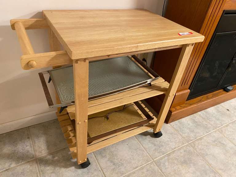 APT… Rolling kitchen island, includes food warmers, see pictures for details.