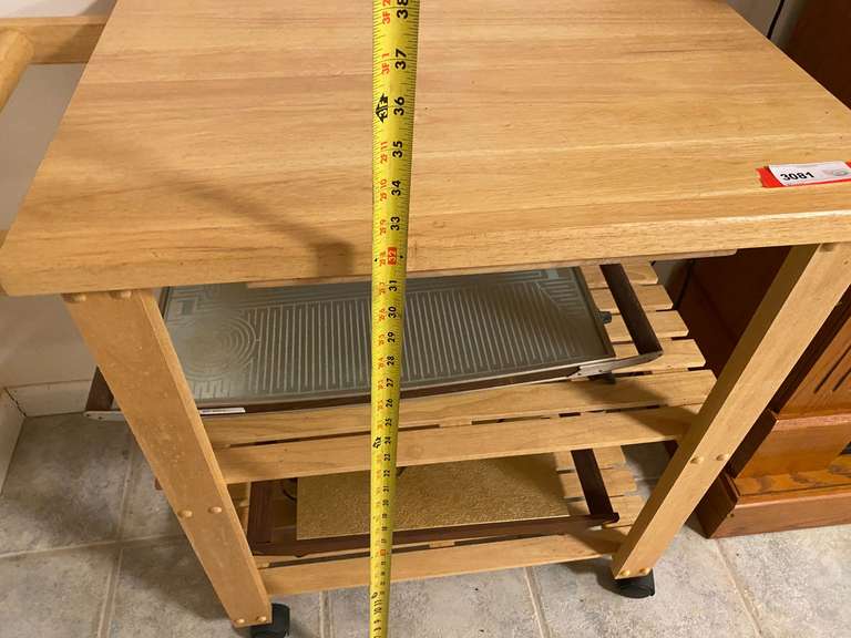 APT… Rolling kitchen island, includes food warmers, see pictures for details.