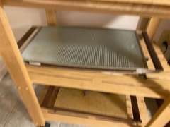 APT… Rolling kitchen island, includes food warmers, see pictures for details.