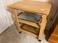 APT… Rolling kitchen island, includes food warmers, see pictures for details.