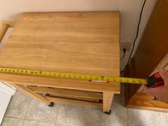 APT… Rolling kitchen island, includes food warmers, see pictures for details.