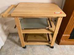 APT… Rolling kitchen island, includes food warmers, see pictures for details.