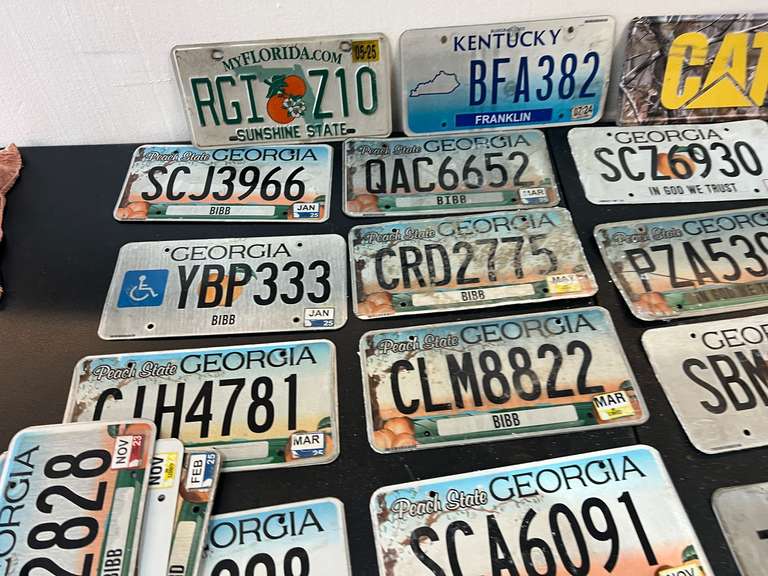 Assorted License plates, approximately 25, see pictures for details.